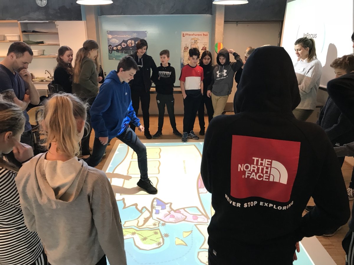 Students working with interactive displays